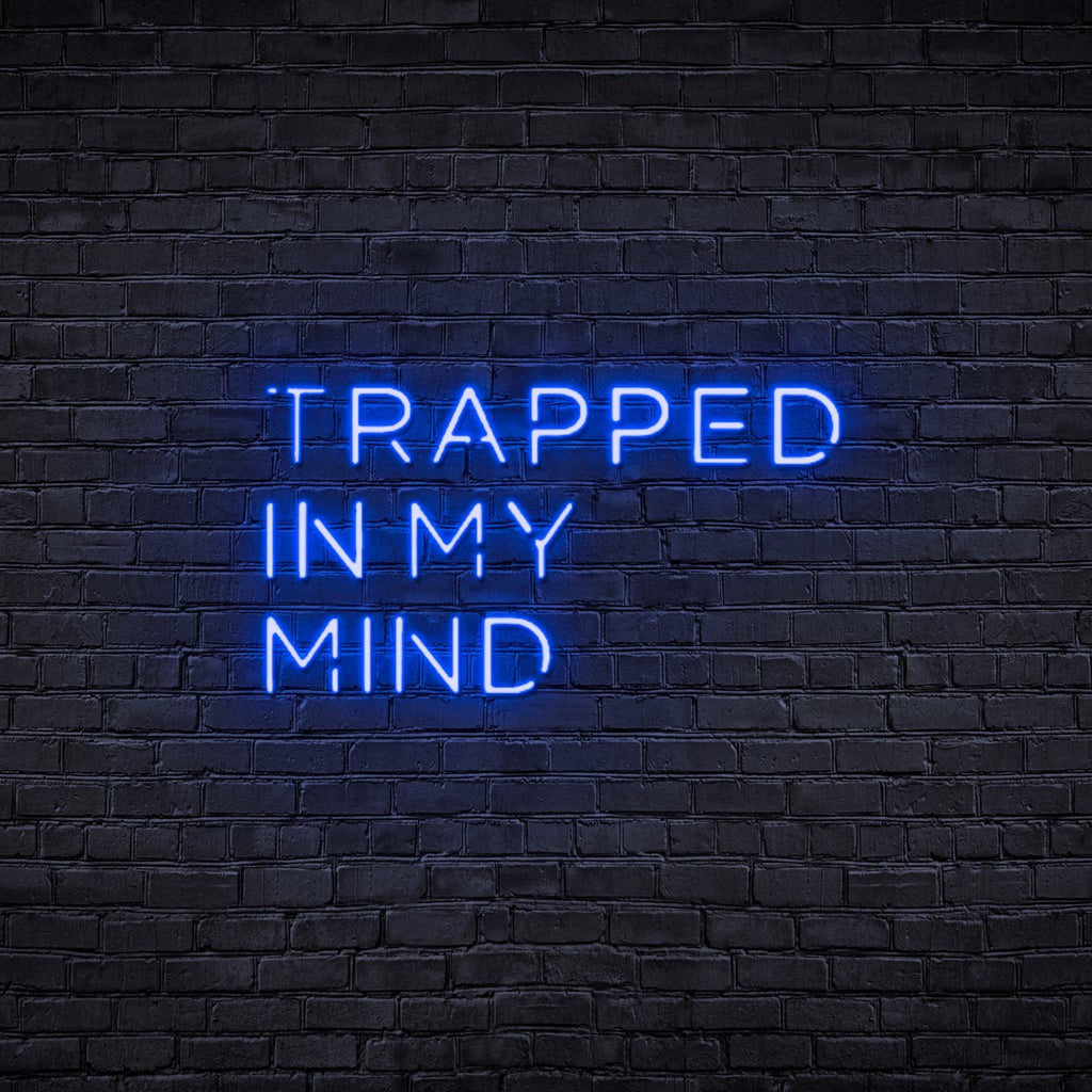 Néon bleu avec lumière LED et citation "Trapped in my mind"