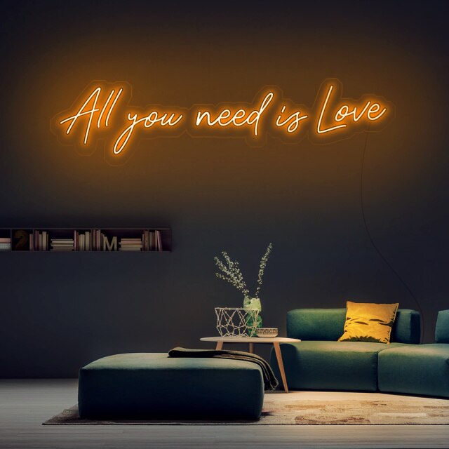 Néon LED avec citation "All you need is love"