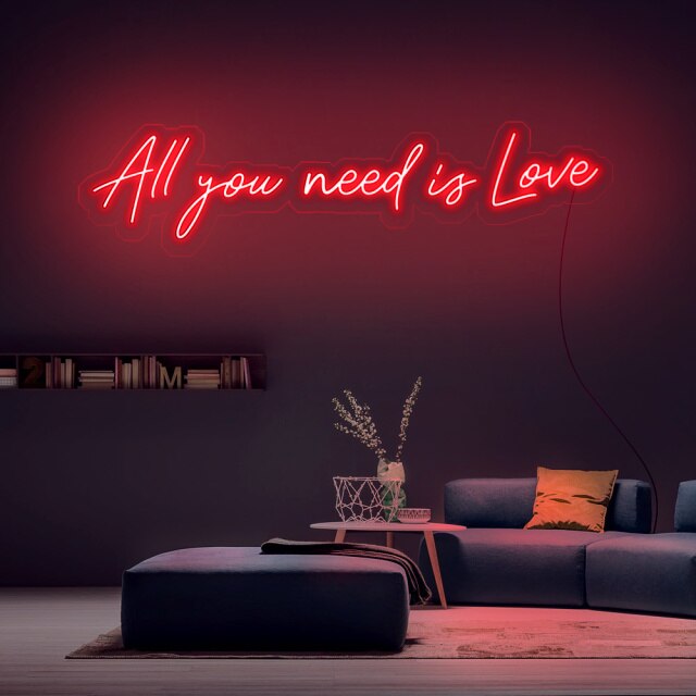Néon à LED rouge avec citation "All you need is love"
